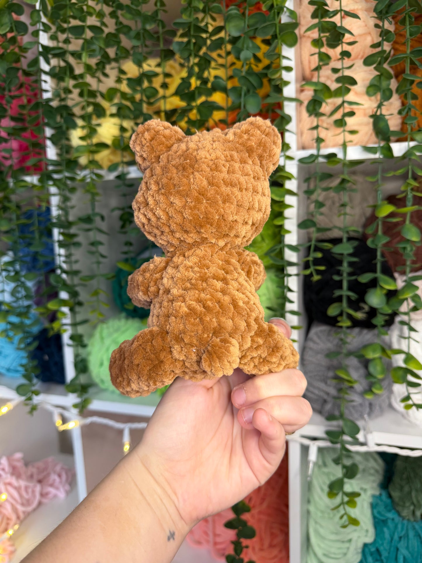 Bear Holding Bee