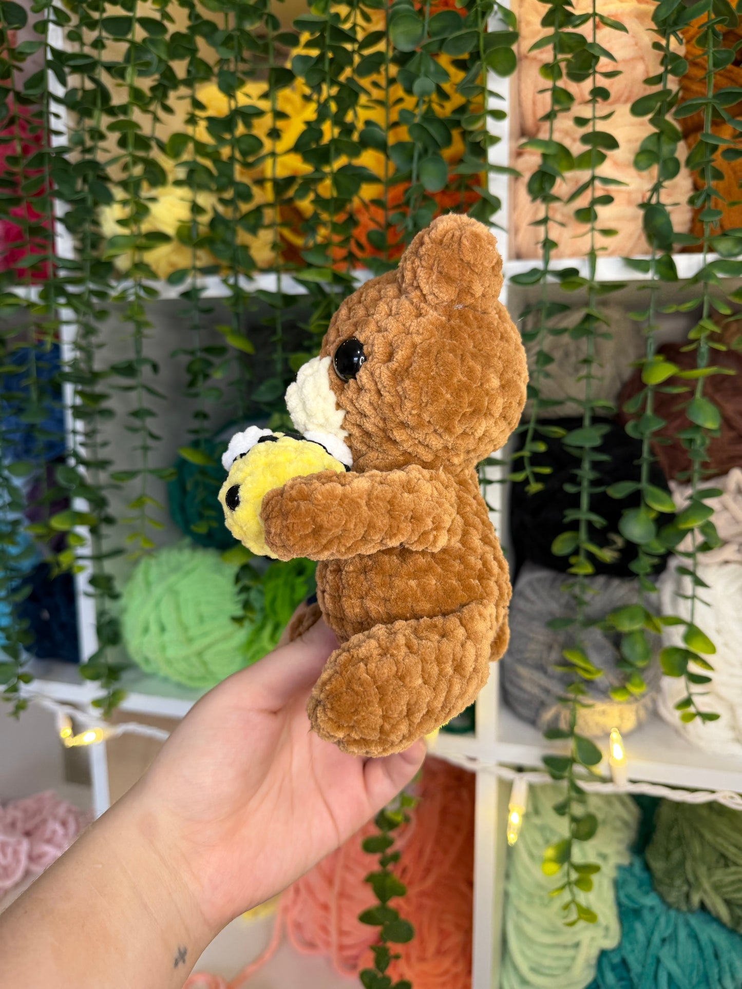 Bear Holding Bee