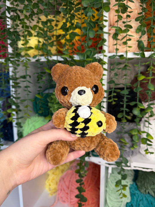Bear Holding Bee