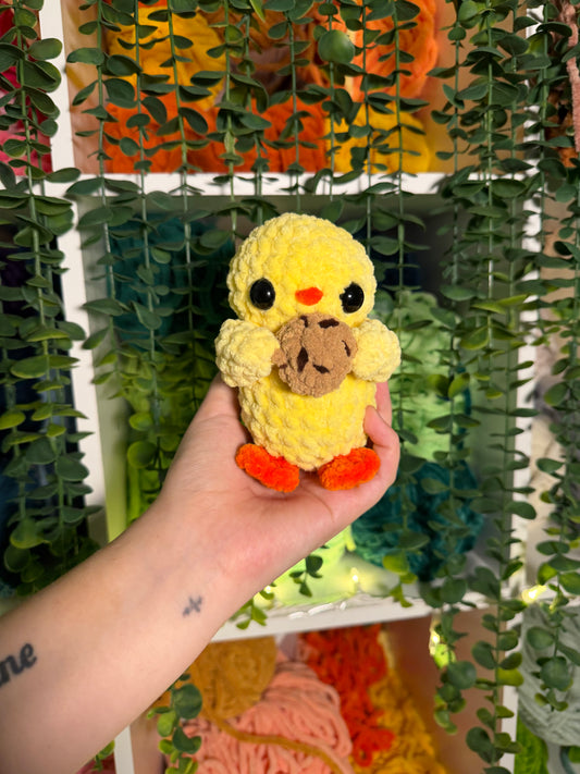 Baby Duck Holding Cookie