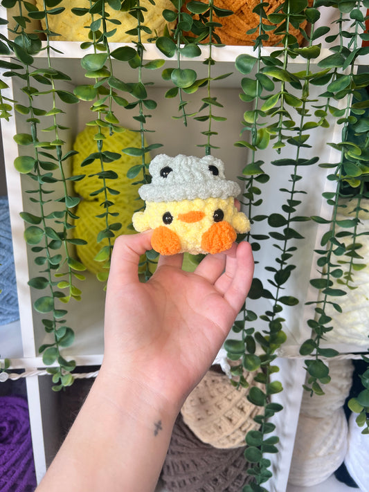 Chick in Frog Hat
